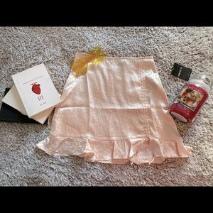 Satin pastel pink skirt. NEW out of the box.